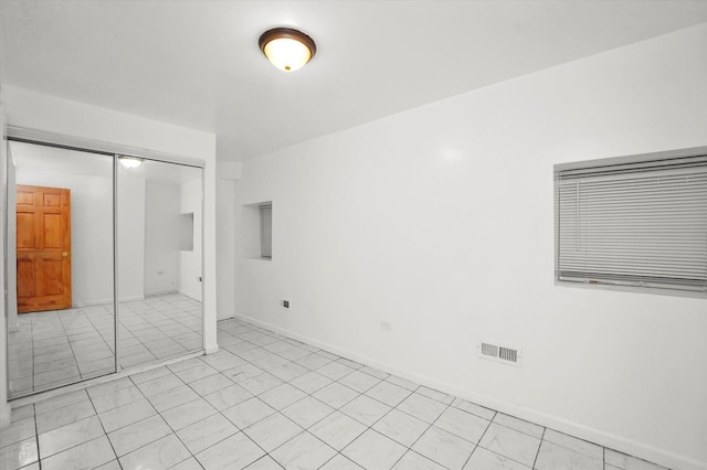 1318 S Kolin Ave, Chicago, IL 60623 - unfurnished bedroom with a closet and baseboards