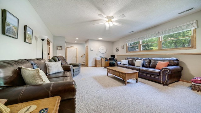 70 Delburne Dr, Davis, IL 61019 - living room featuring carpet flooring, ceiling fan, a textured ceiling, stairs, and recessed lighting