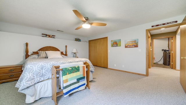 70 Delburne Dr, Davis, IL 61019 - bedroom with light carpet, ceiling fan, and a closet