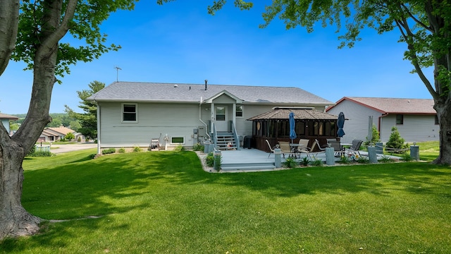 70 Delburne Dr, Davis, IL 61019 - rear view of house featuring a gazebo, a patio, a lawn, and entry steps