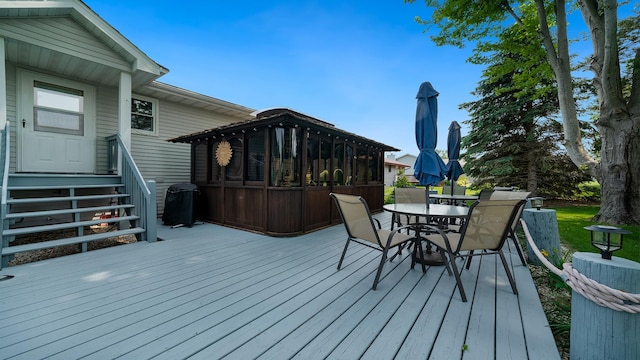 70 Delburne Dr, Davis, IL 61019 - deck with area for grilling and outdoor dining area
