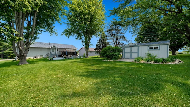 70 Delburne Dr, Davis, IL 61019 - view of green lawn with a shed