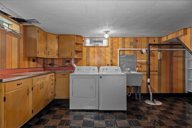 109 N Home Ave, Park Ridge, IL 60068 - laundry area featuring cabinet space, wood walls, washing machine and clothes dryer, and dark floors