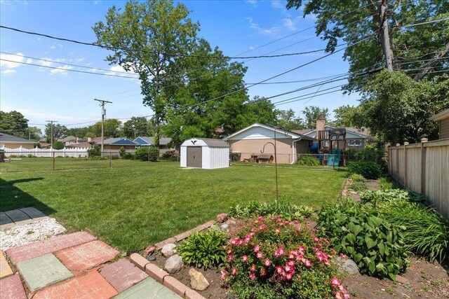 109 N Home Ave, Park Ridge, IL 60068 - fenced backyard featuring a storage unit