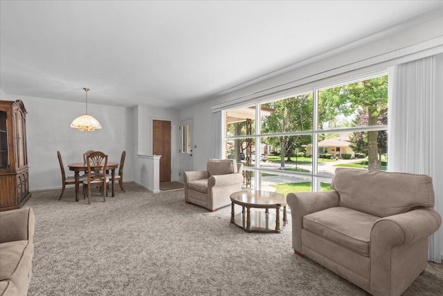 109 N Home Ave, Park Ridge, IL 60068 - living room featuring carpet and a chandelier