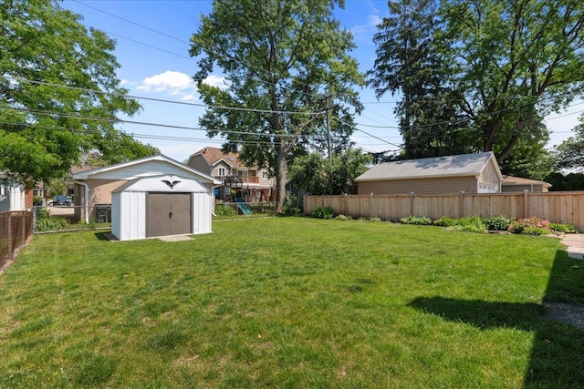 109 N Home Ave, Park Ridge, IL 60068 - fenced backyard featuring a storage unit and a playground