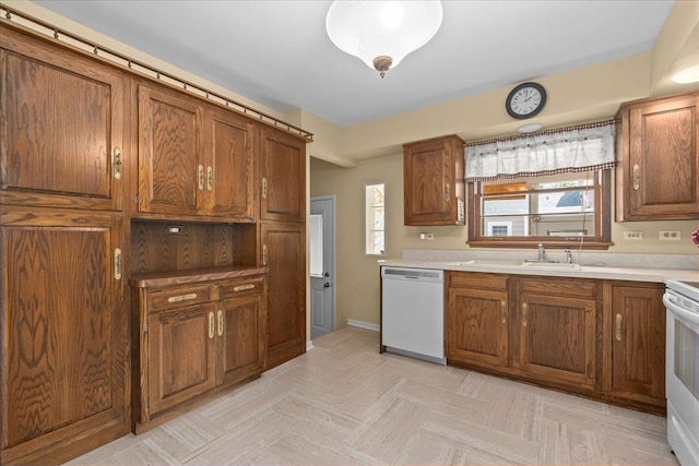 109 N Home Ave, Park Ridge, IL 60068 - kitchen with white appliances, brown cabinets, and light countertops