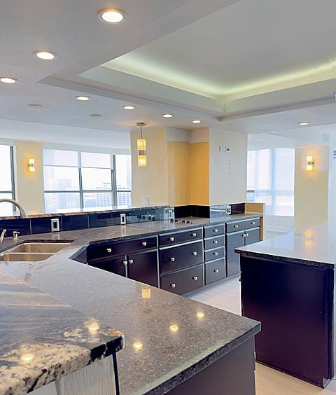 405 N Wabash Ave Unit 5109, Chicago, IL 60611 - kitchen with a large island, healthy amount of natural light, recessed lighting, and a tray ceiling