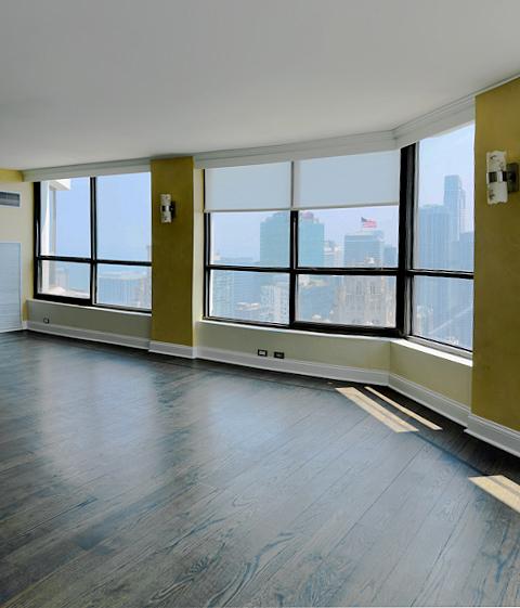 405 N Wabash Ave Unit 5109, Chicago, IL 60611 - spare room featuring dark wood finished floors and baseboards