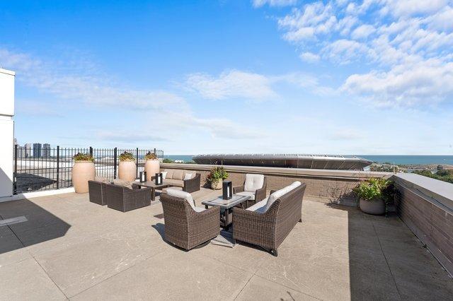 1515 S Prairie Ave Unit 715, Chicago, IL 60605 - view of patio / terrace with an outdoor hangout area and a water view