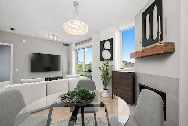 1515 S Prairie Ave Unit 715, Chicago, IL 60605 - dining area featuring track lighting and a chandelier
