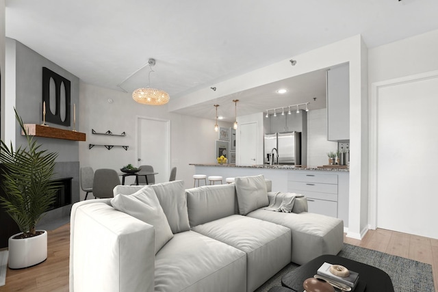1515 S Prairie Ave Unit 715, Chicago, IL 60605 - living room with light wood-style flooring and a fireplace