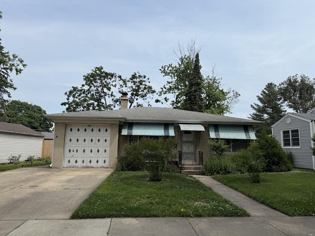 616 E Prairie Ave, Des Plaines, IL 60016 - view of front facade with brick siding, an attached garage, concrete driveway, and a front yard