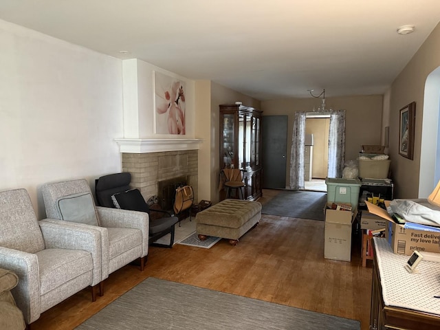616 E Prairie Ave, Des Plaines, IL 60016 - living room with wood finished floors and a brick fireplace