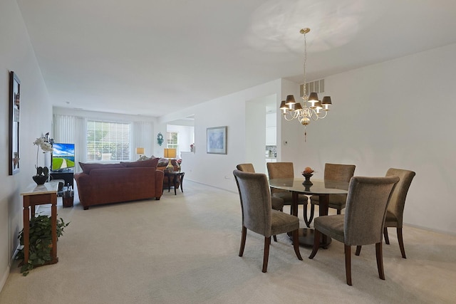 11768 Chatfield Xing, Huntley, IL 60142 - dining room featuring a chandelier and light colored carpet