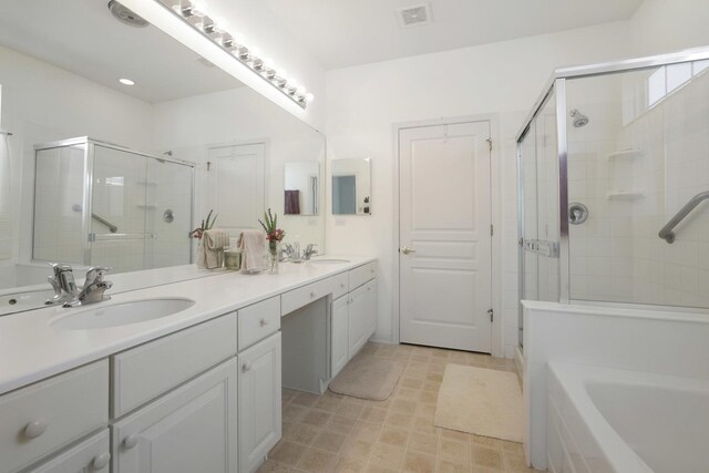 11768 Chatfield Xing, Huntley, IL 60142 - bathroom featuring double vanity, a shower stall, a garden tub, and recessed lighting