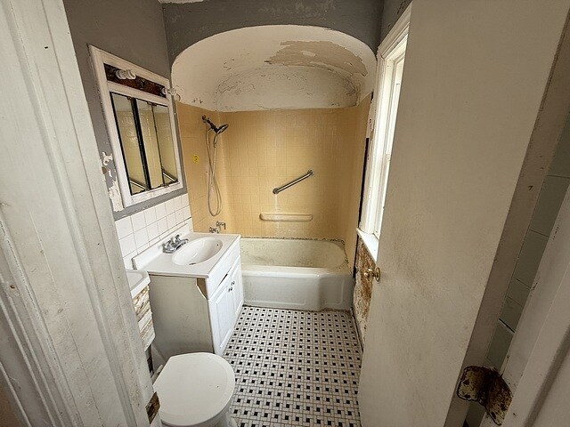 10750 S Ridgeway Ave, Chicago, IL 60655 - full bathroom featuring vanity, bathing tub / shower combination, tile patterned floors, and backsplash