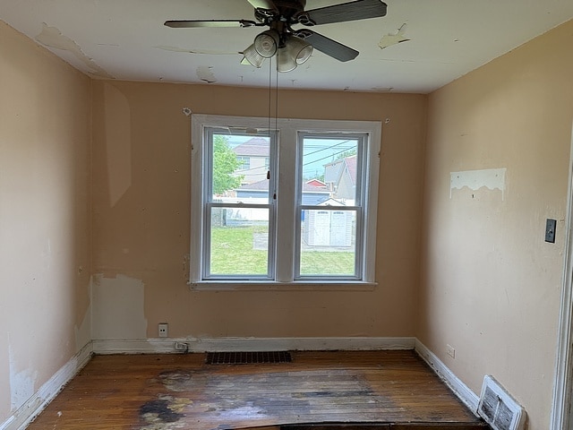 10750 S Ridgeway Ave, Chicago, IL 60655 - spare room featuring wood finished floors and a ceiling fan