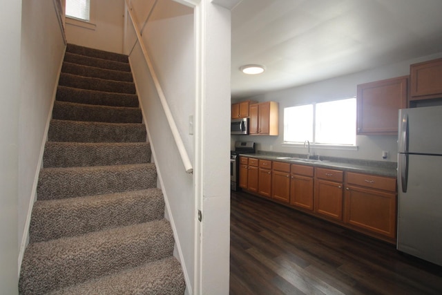 1001 Wilcox St, Joliet, IL 60435 - stairway featuring wood finished floors