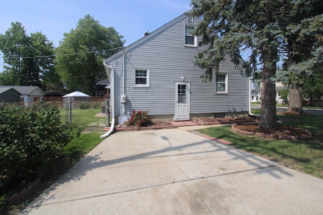 1001 Wilcox St, Joliet, IL 60435 - back of house with a patio