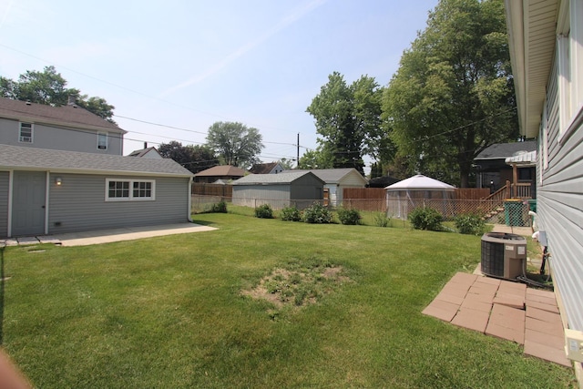 1001 Wilcox St, Joliet, IL 60435 - fenced backyard featuring a patio area