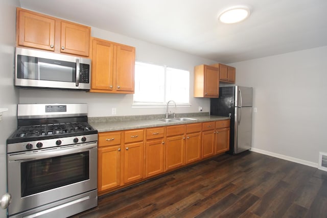 1001 Wilcox St, Joliet, IL 60435 - kitchen featuring appliances with stainless steel finishes and dark wood finished floors