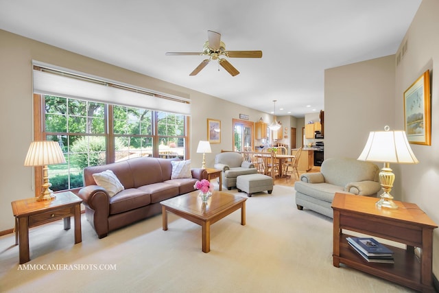 400 Adare Dr, Cary, IL 60013 - living area with ceiling fan and light colored carpet