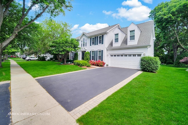 400 Adare Dr, Cary, IL 60013 - view of front of home with driveway, a garage, a front yard, and a shingled roof