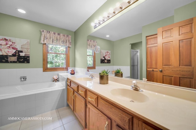 400 Adare Dr, Cary, IL 60013 - bathroom featuring tile patterned floors, double vanity, a bath, and a shower with shower door