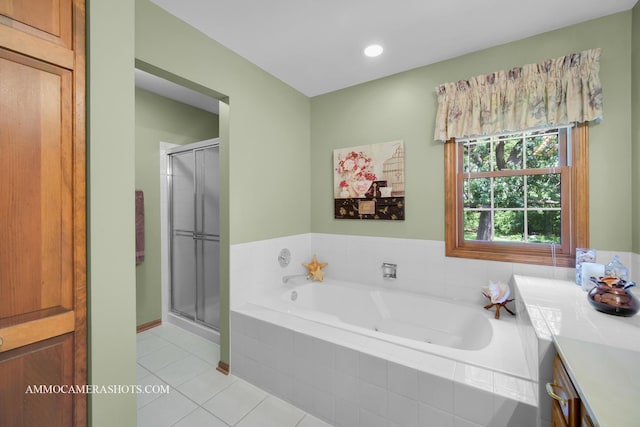 400 Adare Dr, Cary, IL 60013 - bathroom featuring tile patterned flooring, a bath, vanity, and a shower stall