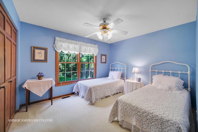 400 Adare Dr, Cary, IL 60013 - bedroom featuring light carpet, a closet, and a ceiling fan