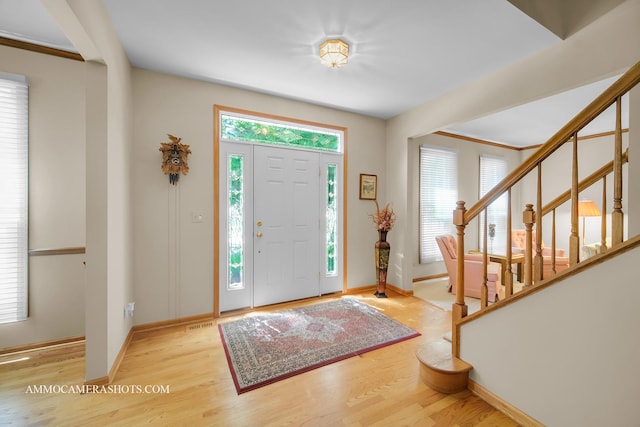 400 Adare Dr, Cary, IL 60013 - entryway with wood finished floors and stairway