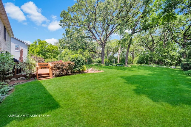 400 Adare Dr, Cary, IL 60013 - view of green lawn with a wooden deck and view of wooded area