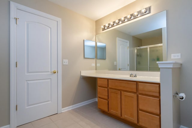 2746 Acorn Ct Unit 2746, West Dundee, IL 60118 - bathroom featuring tile patterned floors, a stall shower, and vanity