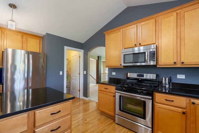 2746 Acorn Ct Unit 2746, West Dundee, IL 60118 - kitchen featuring stainless steel appliances, arched walkways, vaulted ceiling, light wood-style floors, and light brown cabinetry