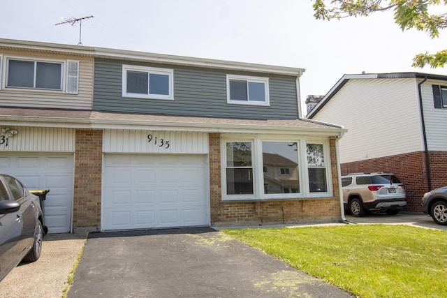 9135 Hollyberry Ave, Des Plaines, IL 60016 - view of property featuring brick siding, a front lawn, driveway, an attached garage, and roof with shingles