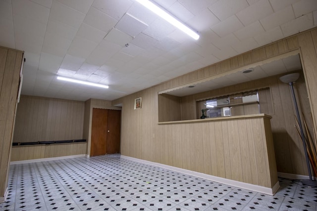 9135 Hollyberry Ave, Des Plaines, IL 60016 - spare room with wood walls and light flooring