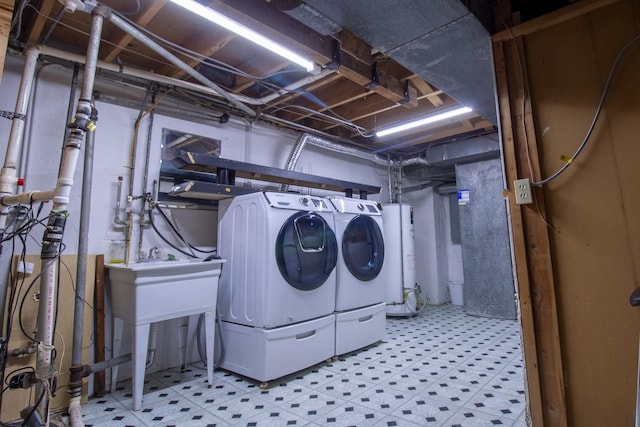 9135 Hollyberry Ave, Des Plaines, IL 60016 - washroom with water heater, light flooring, and washing machine and clothes dryer