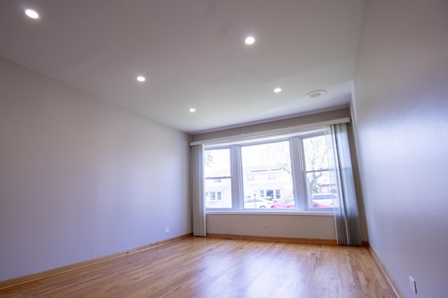 9135 Hollyberry Ave, Des Plaines, IL 60016 - spare room with light wood-style floors and recessed lighting