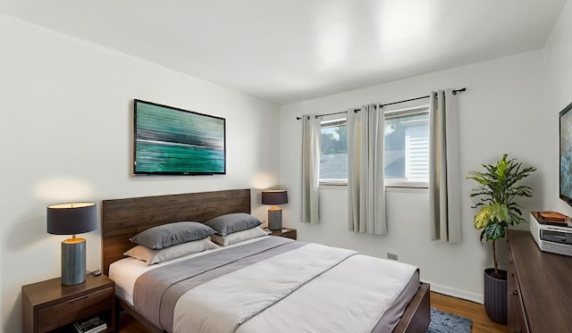 139 Hyde Park Ave, Bellwood, IL 60104 - bedroom with wood finished floors and baseboards