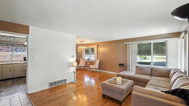 139 Hyde Park Ave, Bellwood, IL 60104 - living area featuring wood finished floors and baseboards