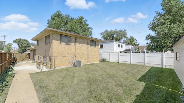139 Hyde Park Ave, Bellwood, IL 60104 - back of house featuring brick siding and a fenced backyard