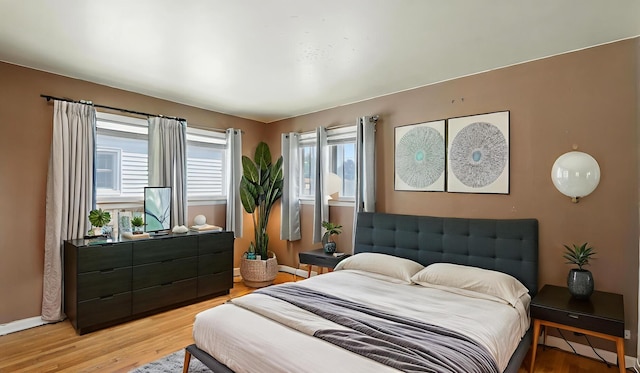 139 Hyde Park Ave, Bellwood, IL 60104 - bedroom with light wood-style flooring