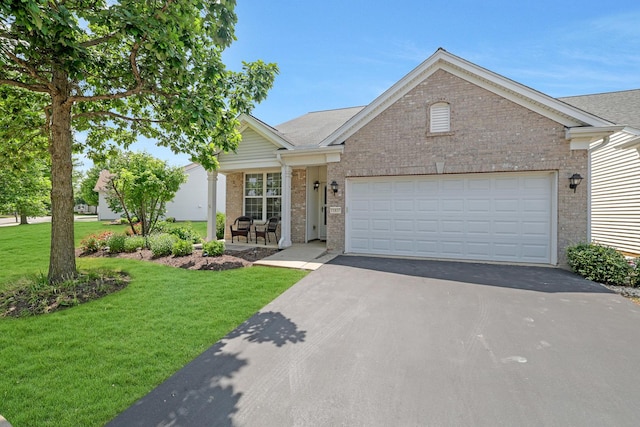 11837 Messiner Dr, Huntley, IL 60142 - ranch-style home with brick siding, driveway, a garage, and a front yard
