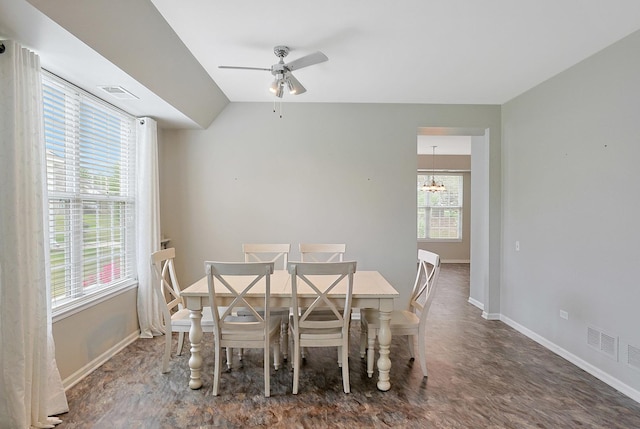 11837 Messiner Dr, Huntley, IL 60142 - dining area with ceiling fan, a chandelier, and lofted ceiling