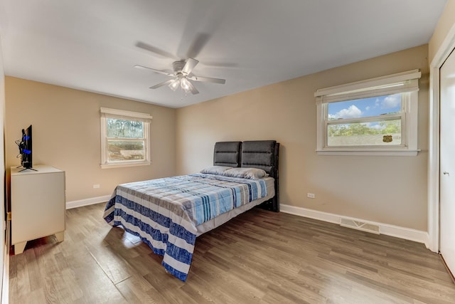 22904 Valley Dr, Richton Park, IL 60471 - bedroom with wood finished floors and ceiling fan