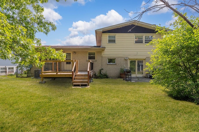 22904 Valley Dr, Richton Park, IL 60471 - rear view of property with a deck, brick siding, a yard, and a patio area