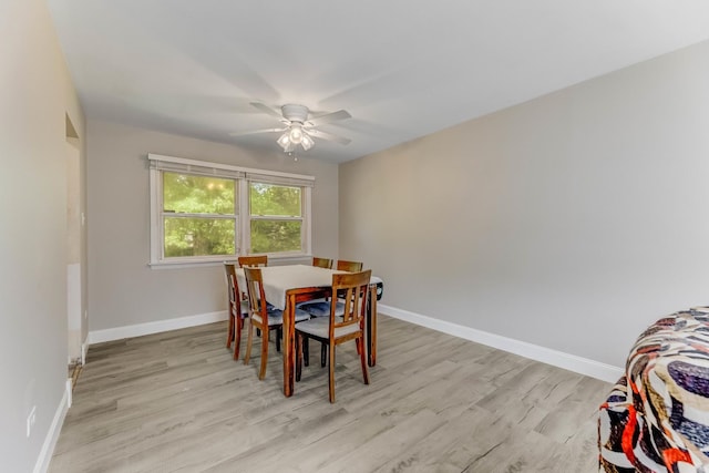 22904 Valley Dr, Richton Park, IL 60471 - dining area with light wood finished floors and ceiling fan