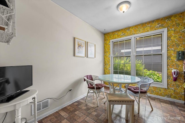 442 Kings Way, Mundelein, IL 60060 - dining space featuring wallpapered walls and brick patterned floors