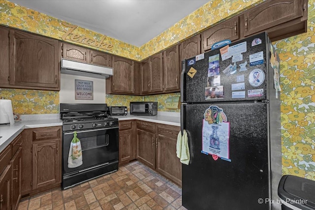 442 Kings Way, Mundelein, IL 60060 - kitchen with black appliances, extractor fan, wallpapered walls, light countertops, and brick patterned flooring